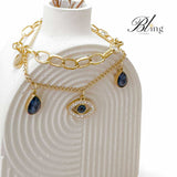 BLING Layered Gold Evil Eye Charm Bracelet – Dual Chain Design with Teardrop Crystals