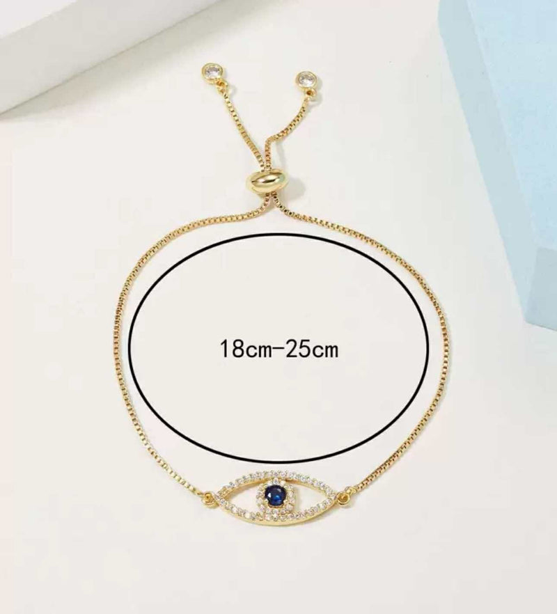 BLING Gold Adjustable Evil Eye Slider Bracelet with Sapphire Blue Center – Crystal-Studded Protection Charm