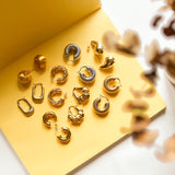 DAZZLE Vintage Gold C Stud Earrings